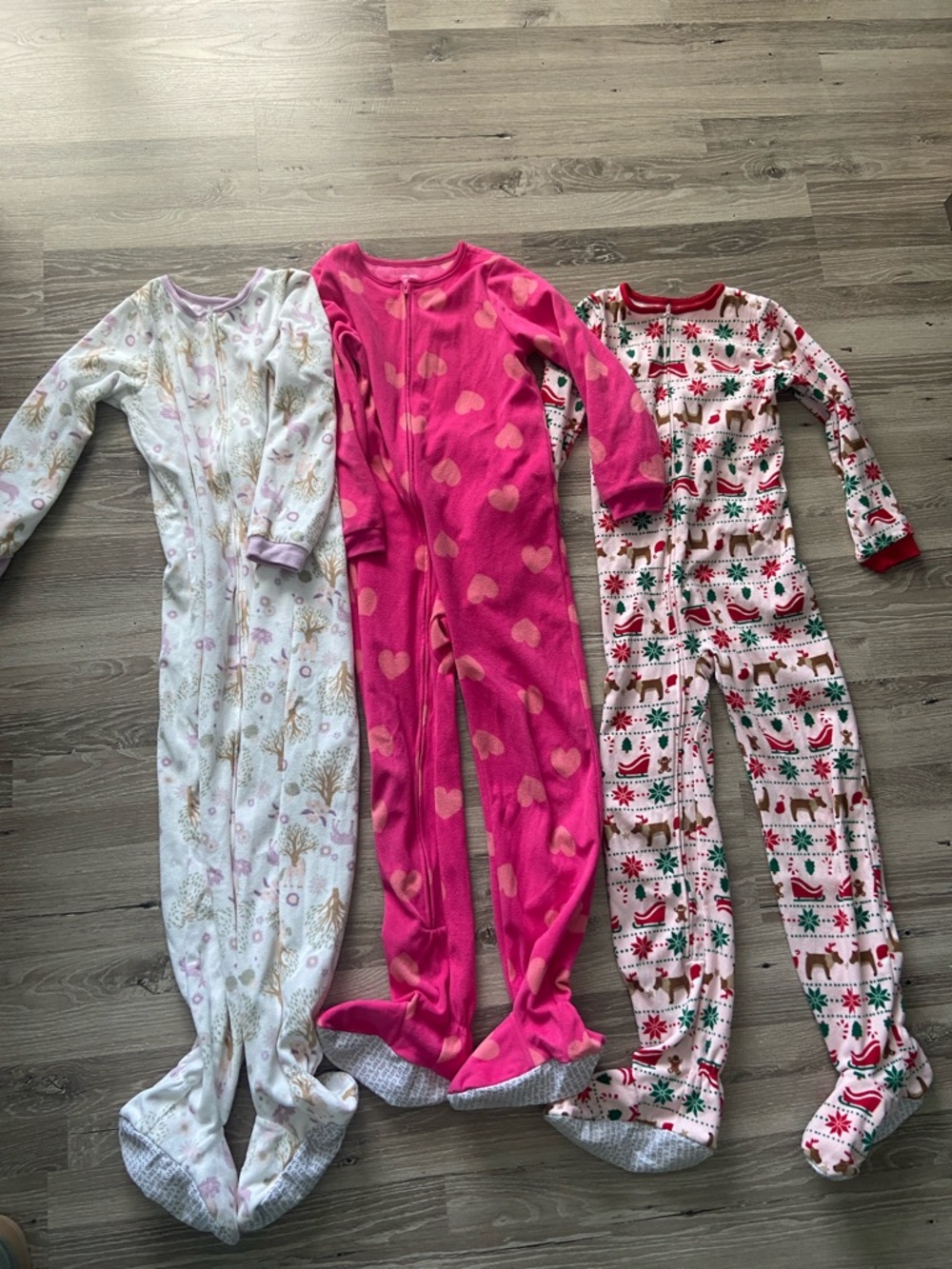 Carter’s youth size 10 footed snuggly pajamas.